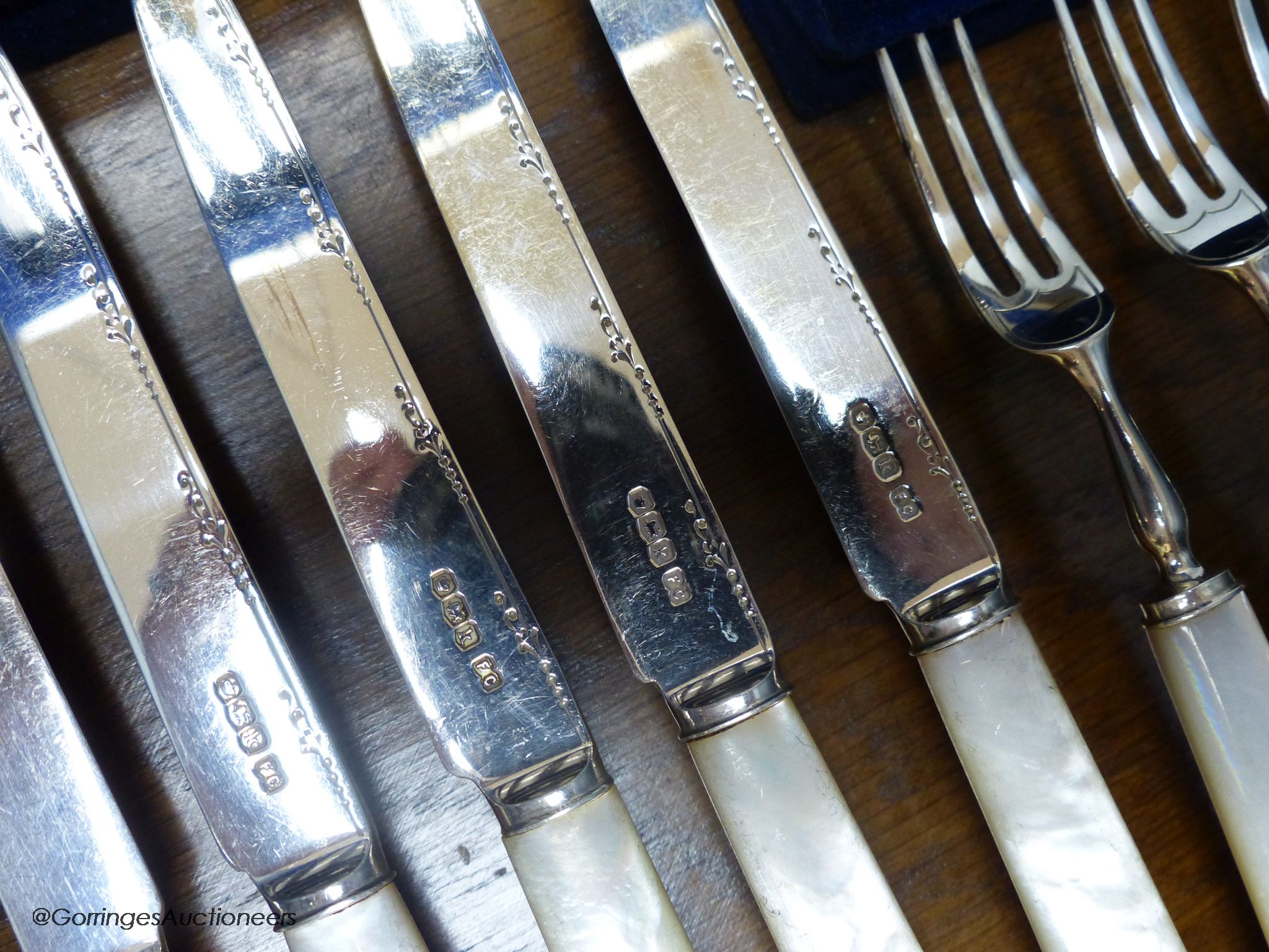 A cased set of George V mother of pearl handled silver dessert eaters, Frank Cobb & Co Ltd, Sheffield, 1927